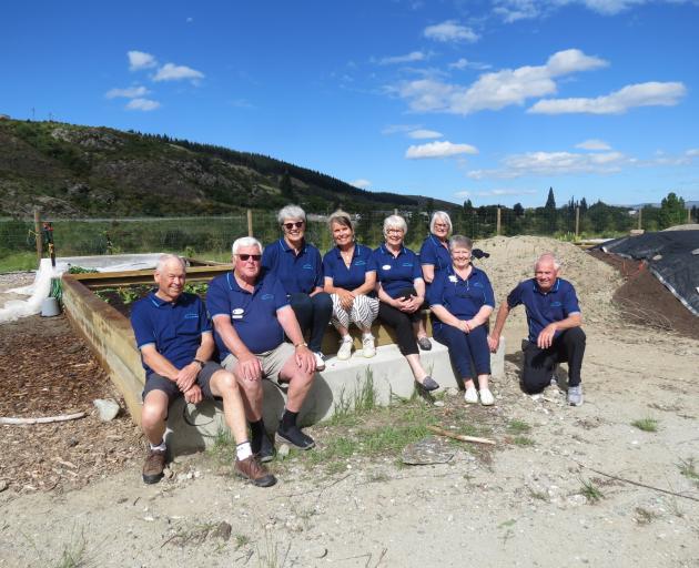 Clyde and Districts Lions Club members gathering around their recently planted produce are (from...
