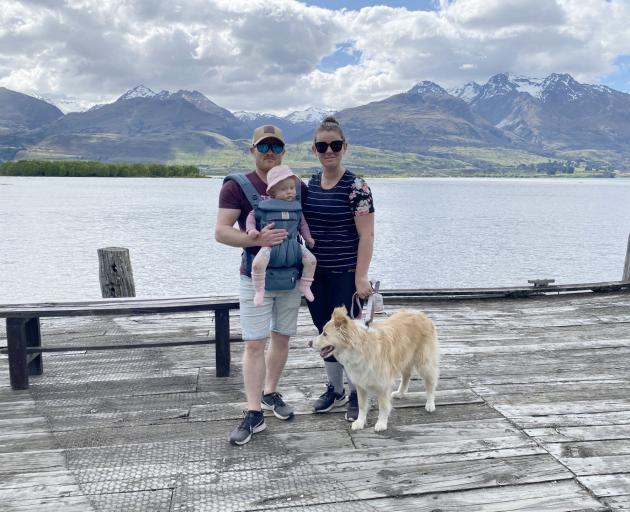 Ryan and Rachael Inch along with daughter Amelia (11 months) and dog Mia stand on the wharf at...
