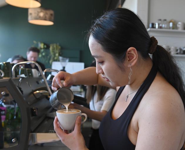 Barista Ruoling Chen competes in the Dunedin latte art throw down competition at Strictly Coffee...