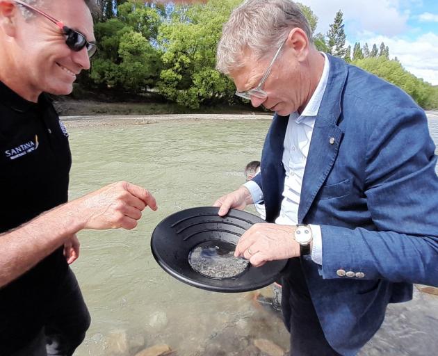 World Gold Panning Championships organiser Terry Davis (left) admits to salting Arts, Culture and...