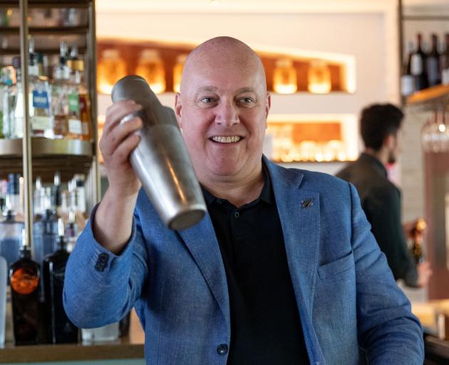 Busy mixing a mocktail at Soda in Queenstown yesterday, Prime Minister Christopher Luxon said...
