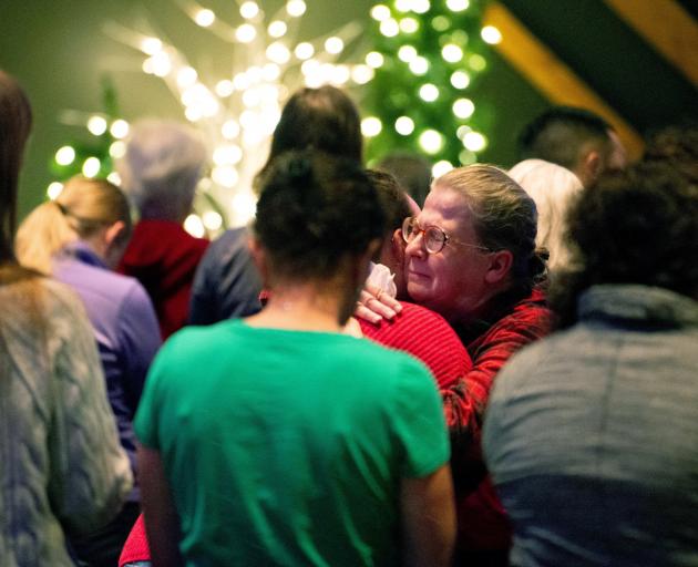 Worshipers at Blackhawk Church gather to pray for victims and survivors of the shooting at the ...