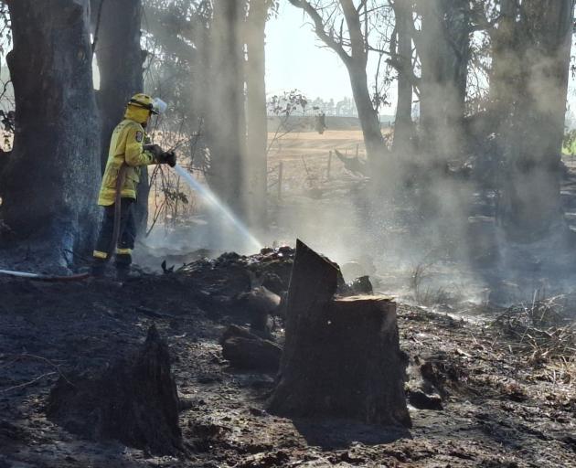 The West Melton fire is contained but crews are working to extinguish hotspots. Photo: Fenz 