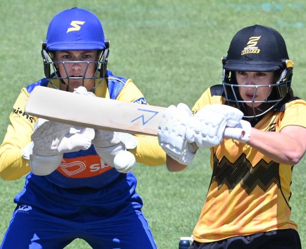 Otago Sparks wicketkeeper Polly Inglis has her eyes glued to the ball as Wellington batter Xara...