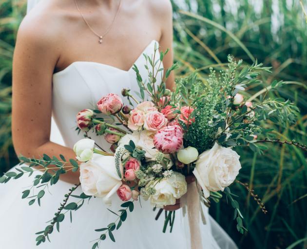 Summer is wedding season but some brides are going down the aisle without a beautiful bouquet....