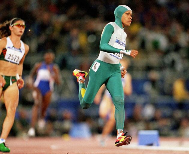 Cathy Freeman races towards her 400m gold at the Sydney Olympics. PHOTO: GETTY IMAGES