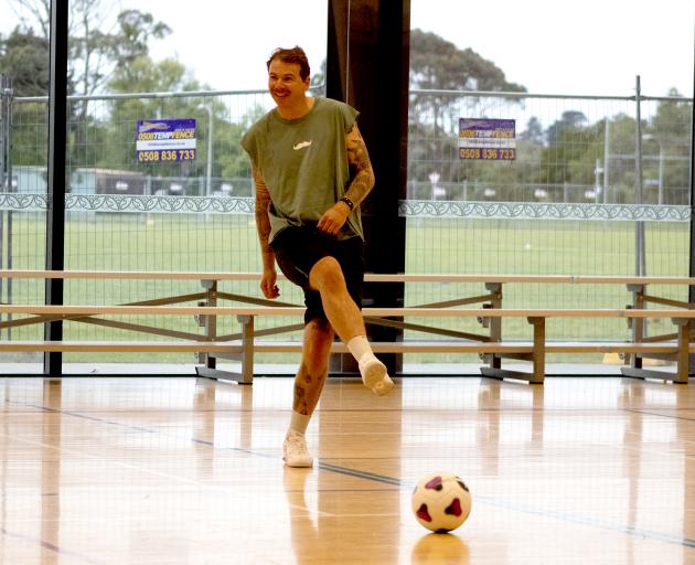 Hamish Mitchell plays a pass. PHOTO: NATE'S SPORTS PHOTOGRAPHY