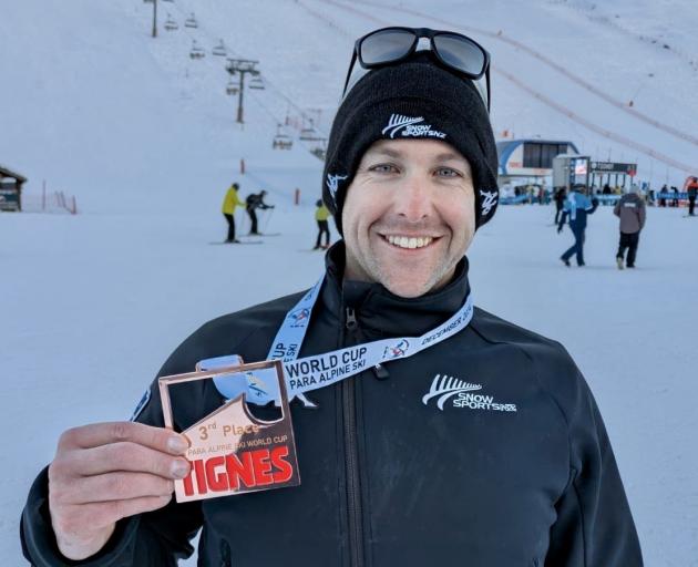 Adam Hall celebrates winning another world cup medal in France. PHOTO: SNOW SPORTS NZ