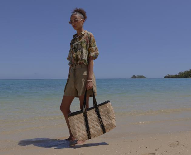 Karen Walker has partnered with Rise Beyond the Reef for a great summer bag. 