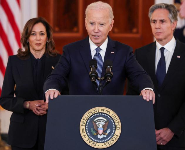 US President Joe Biden (centre) with deputy vice president Kamala Harris and Secretary of State...