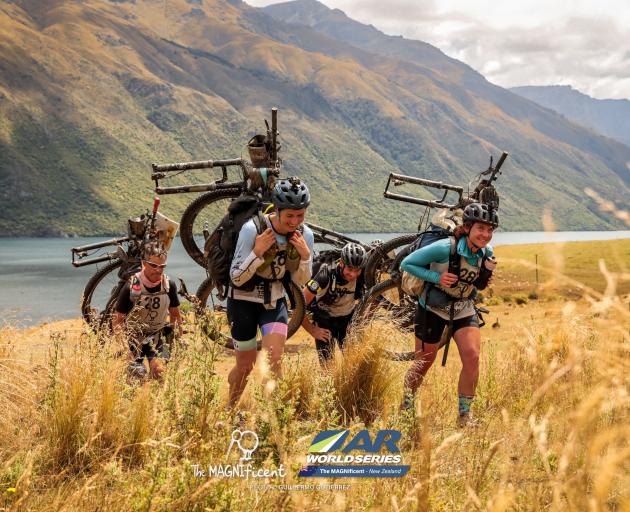 Near Kingston, the New Zealand team competing in the Magnificent expedition race (from left),...