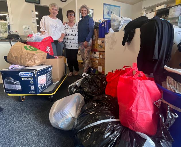 St Vincent De Paul Society volunteers (from left) Trish Sheridan, June Searle and Jan Drylie look...