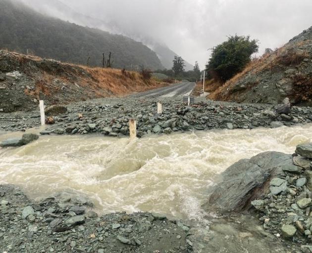 Flooding of the Lower Hollyford Rd in Fiordland endangers its future due to a cut in government...