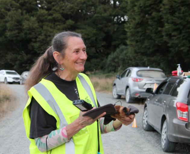 Forest & Bird co-ordinator Katriona Gower shows bat-spotters how to use the gear and what to look...