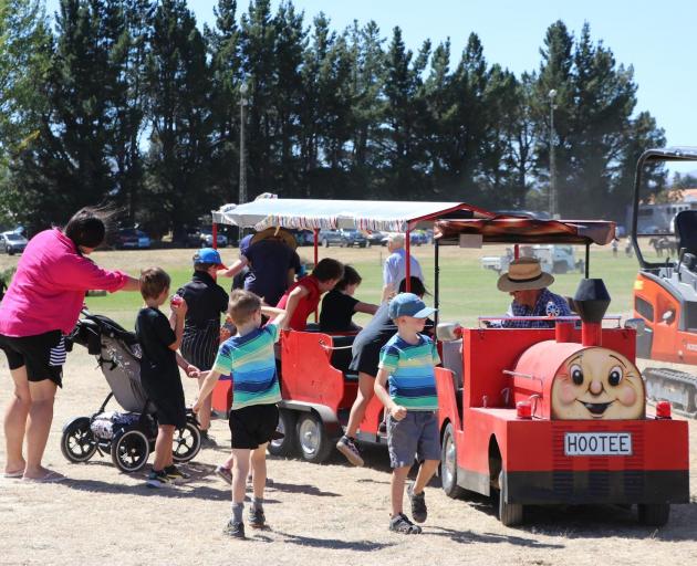 Children enjoy a ride around the Maniototo Stadium on Hootee yesterday. PHOTO: ELLA JENKINS