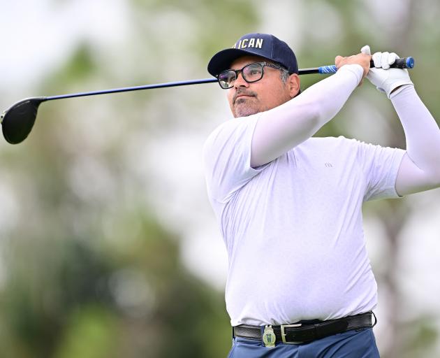 Hollywood actor Michael Pena plays a shot during the final round of the Tournament of Champions...
