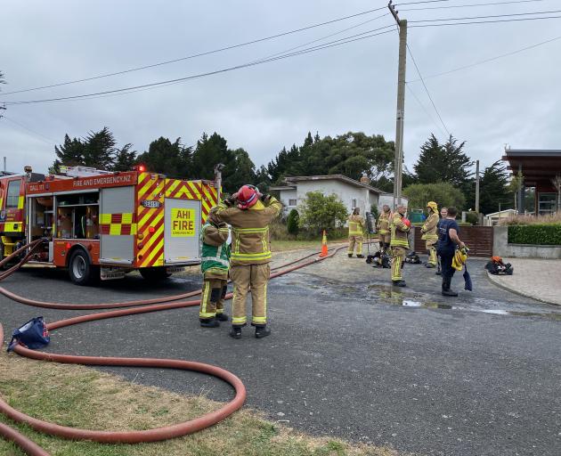 Fire crews at Harwood this morning. Photo: Peter McIntosh