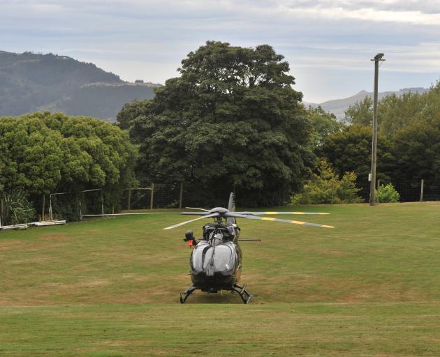 A rescue helicopter touches down at Mornington Park this morning. Photo: Gregor Richardson