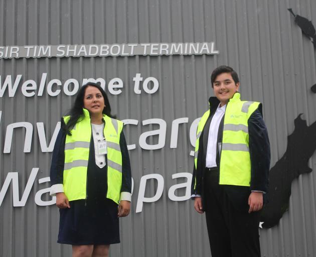 Sir Tim Shadbolt’s partner Asha Dutt and son Declan, 12, pictured in front of the Invercargill...