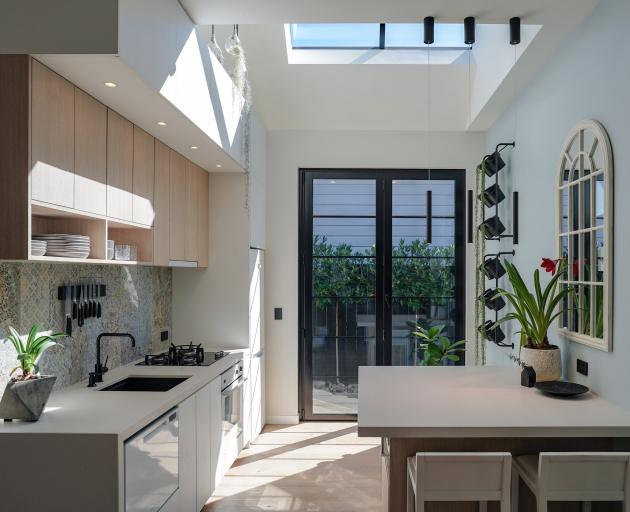The owners wanted to make the kitchen lighter and more functional with a clean, timeless...