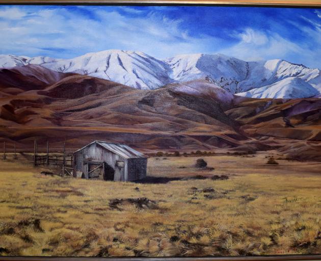 A painting by Nahin Kingsbury of the house where Angela Scott’s grandparents raised their family.