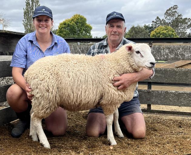 Wharetoa Genetics owner Garth Shaw and second-in-charge Tia Bisset with Texel ram lamb A118/24,...