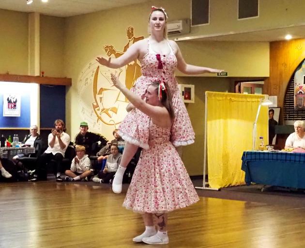 Kyra Hope-Johnstone lifts Jess Anderson during the South Island Invitation Contest. PHOTO: MIKE...