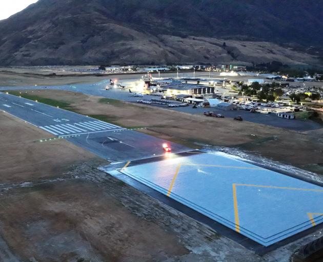 Queenstown Airport’s completed engineered materials arresting system, marked with chevrons, at...