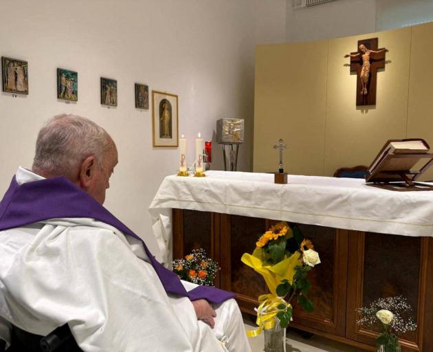 Pope Francis in the chapel of the Gemelli hospital in Rome in this photo released by the Vatican...