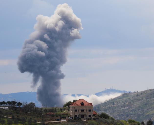 Smoke rises into the sky at the border between Israel and southern Lebanon. Photo: Reuters 