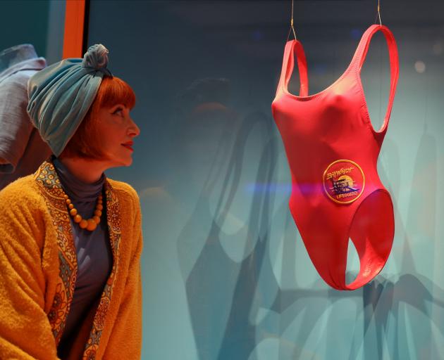 British fashion expert and guest curator Amber Butchart looks at Pamela Anderson's red Baywatch...