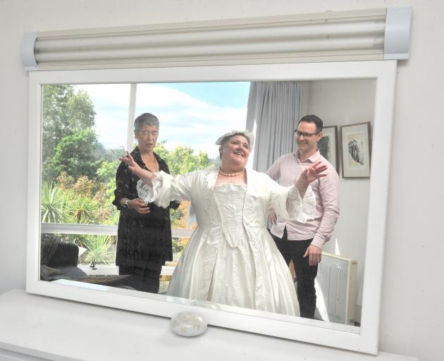 Claire Barton tries on her period costume made by Charmian Smith (left) which will transform her...