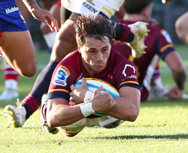 The Highlanders’ Nathan Hastie scores the first try against Moana Pasifika during their round...