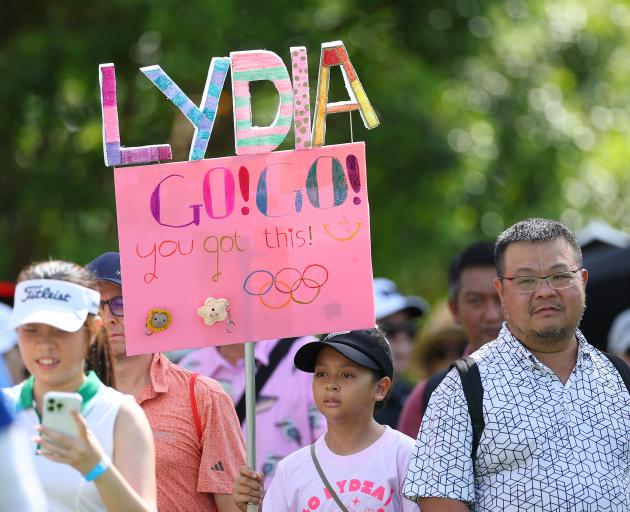 A young fan waves her sign for Lydia Ko during a tournament in Singapore this month. Could we see...