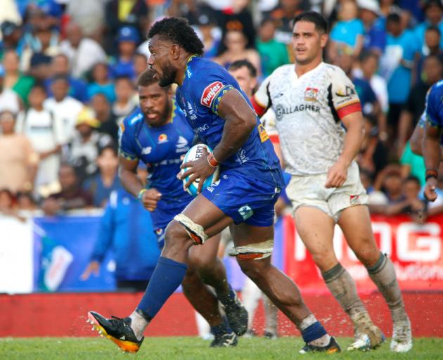 Elia Canakaivata of Fijian Drua runs the ball during the round four Super Rugby Pacific match...