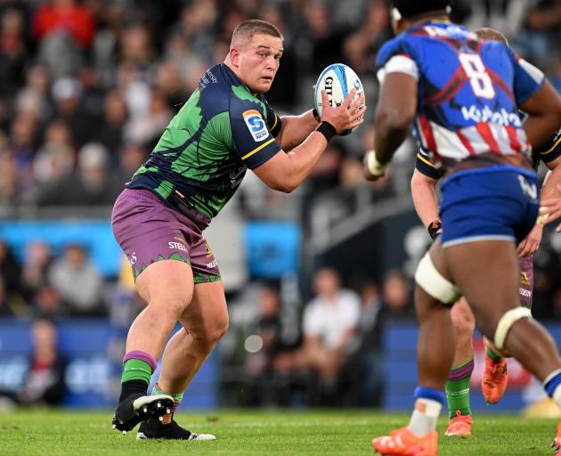Highlanders prop Ethan de Groot, in the team’s one-off Hulk jersey, looks for options during the...