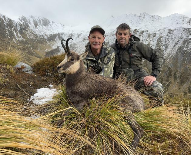 Out hunting are Stacey Anderson (right) with one of his clients, Dennis Mayhew, of Montana,...