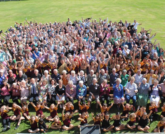 The attendees of the 150th-year celebration of Mataura School gathered together, from past and...