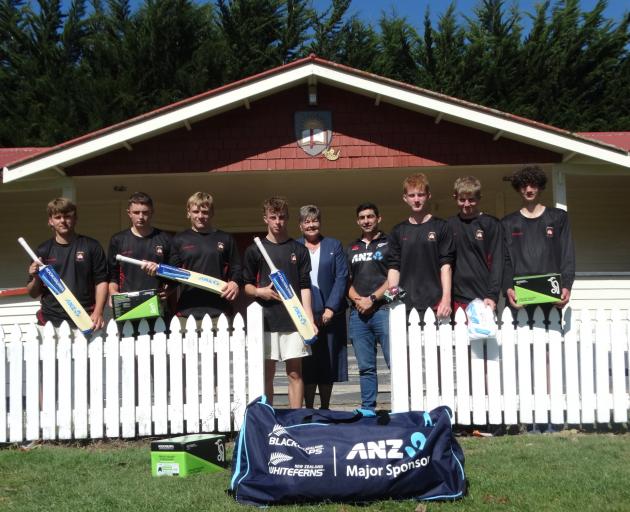 Oamaru ANZ branch manager Philippa Mackenzie and IT manager James Braid present $2000 worth of...