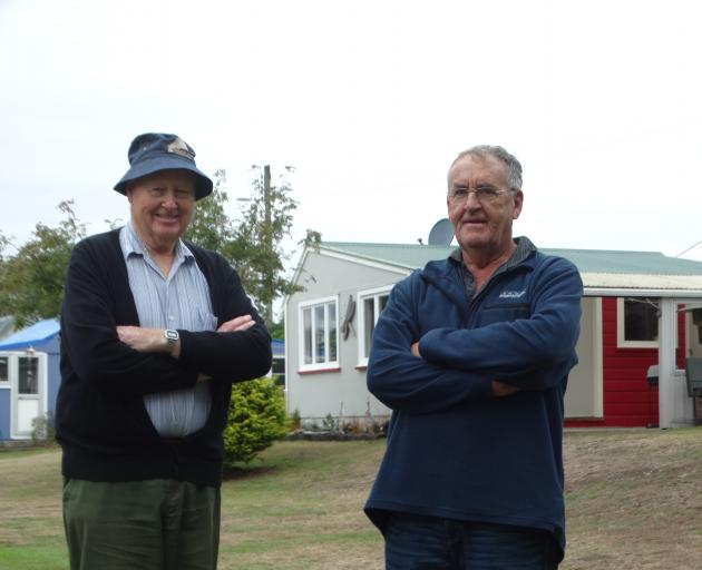 Glenavy Fishing Camp secretary Trevor Hill (left) and president Noel Simpson are on the hunt for...