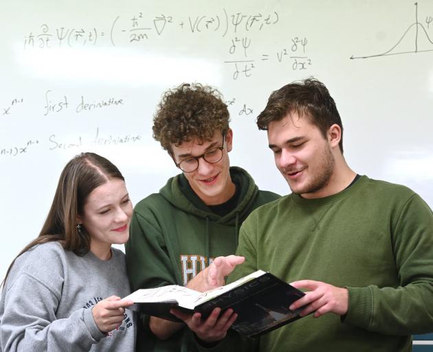 Dunedin siblings (from left) Emilie, Reuben and Liam Cook are all studying physics at the...