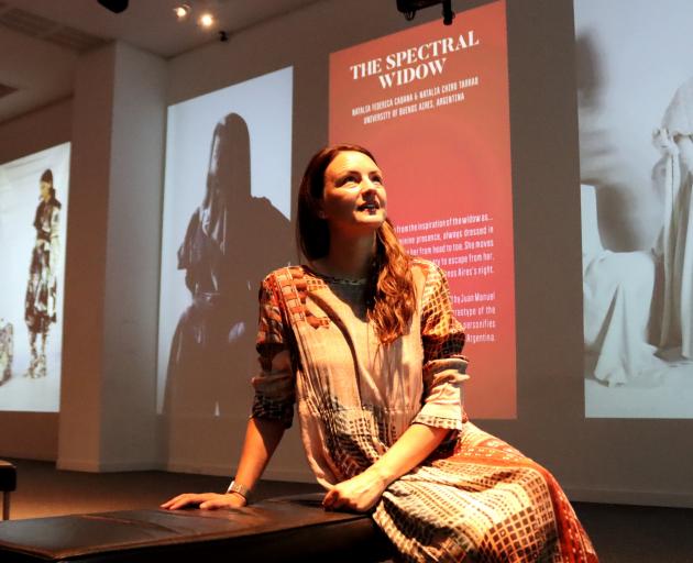 iD event manager Victoria Muir admires fashion projections at Tūhura Otago Museum. PHOTO: SAM...