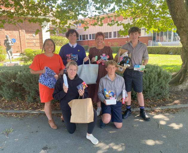 Timaru Boys’ High School students digging deep for the Grace Millane Handbag Appeal are (back row...