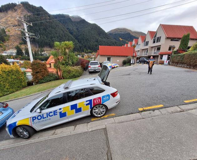 Police in Turner St in Queenstown, where a tourist had a serious fall. PHOTO: GUY WILLIAMS