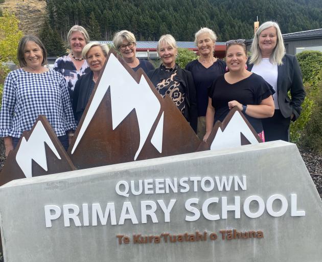Principal Fiona Cavanagh, fourth from right, with long-serving teachers, from left, Susan...