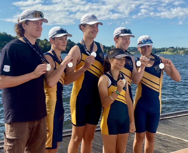 Wakatipu High’s silver-winning U15 quad, from left, coach Ashton White, Baxter Kingan, Reuben...