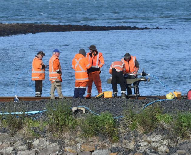Work to repair a cable about 50m south of the entrance to the Sawyers Bay railway tunnel...