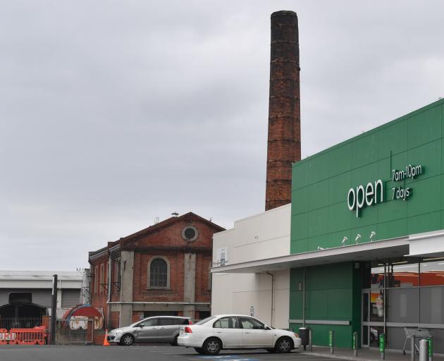 The Dunedin Gasworks Museum chimney stack is right beside the Dunedin South Woolworths...