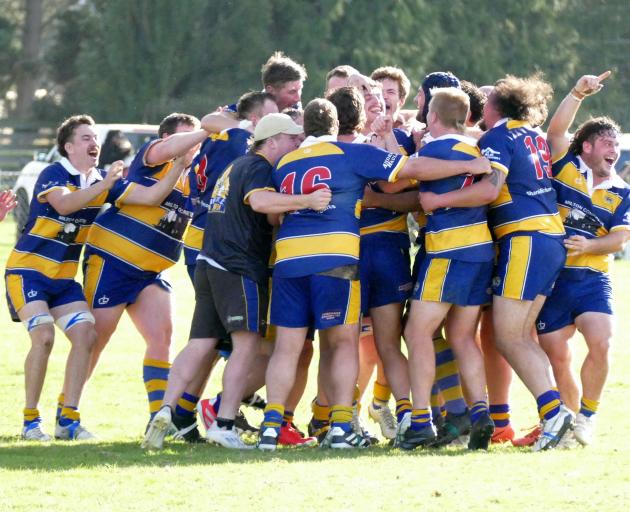 Toko RFC premiers celebrate on their home ground in Milton on Saturday after defeating Crescent...