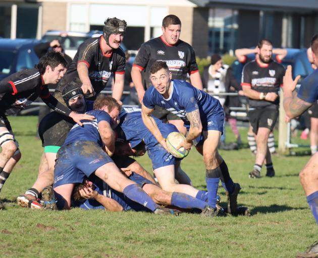 Wyndham half back Tyrone Braven passes the ball from the back of a ruck during a Rugby Southland...